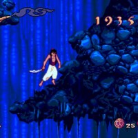 Aladdin saute sur une plateforme dans une grotte de la version MegaDrive du jeu